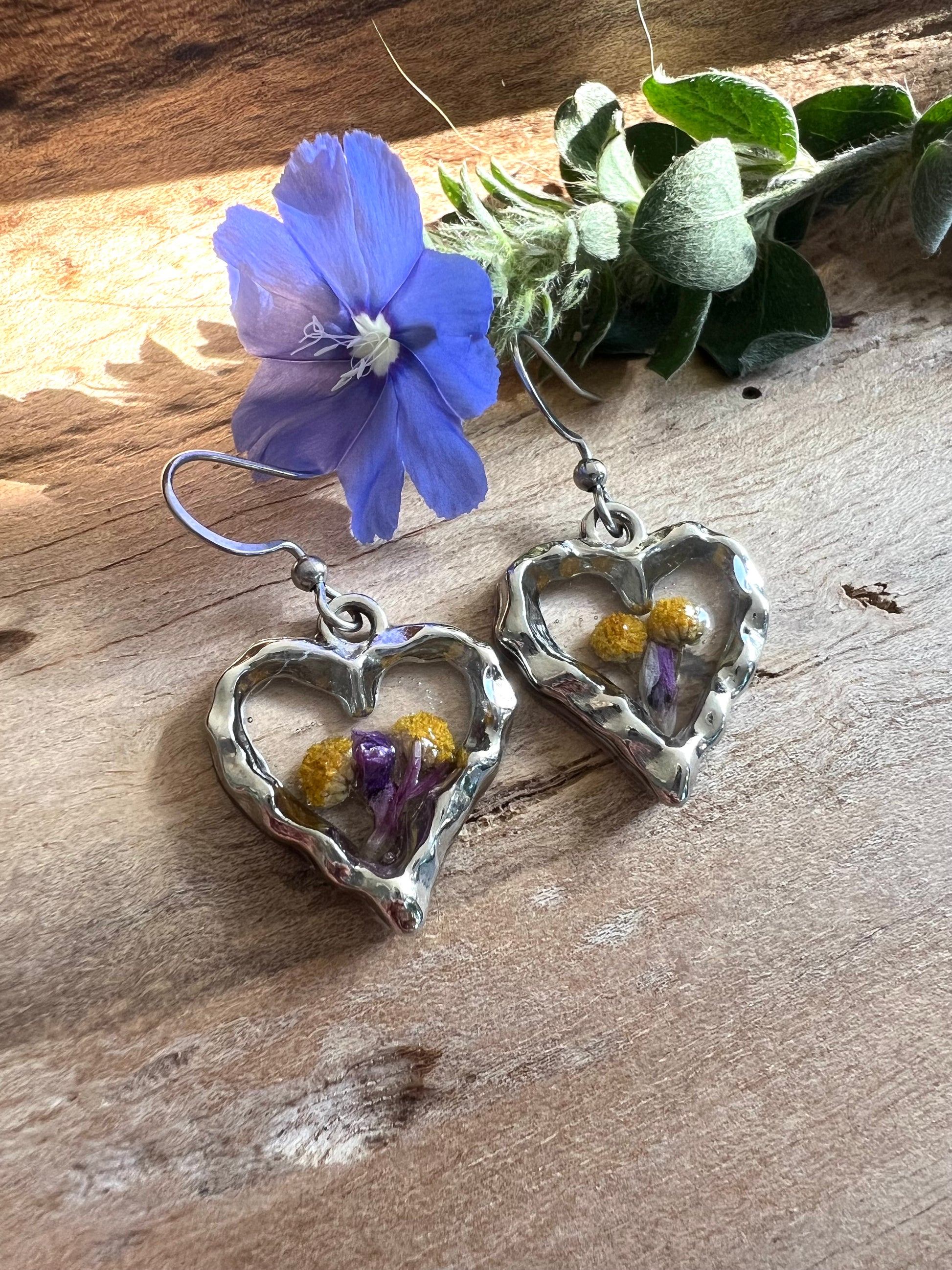 Dainty silver heart shape earrings with yellow and purple wild flower fynbos of Cederberg minimalist perfect gift